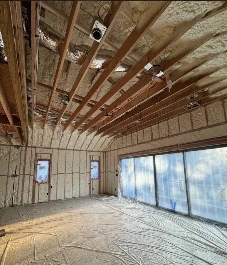 Interior walls and ceiling insulated with spray foam during new construction in Wahpeton